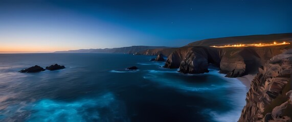 Magnificent rocky coastline meeting vivid blue ocean showcasing natures beauty