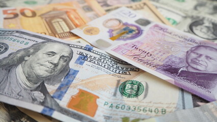 Mix of different banknotes in chaotic arrangement