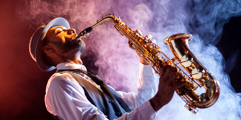Musician playing the saxophone on stage