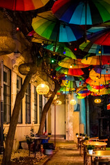 Colorful background of floating umbrellas