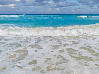  Ocean waves on the beach. Cancun, Mexico.