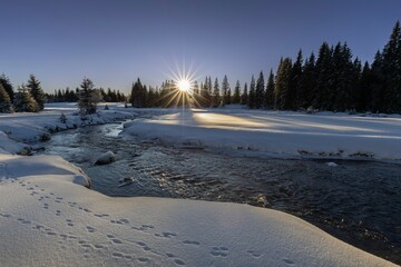 Winter motif. Landscape of Šumava. Winter mood photography. Snow. Dawn in the mountains. Beautiful picture. Roklanský stream. 