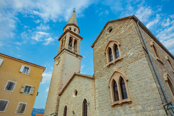 Fototapeta premium Streets of the old town of Budva with stone walls and cobblestones.