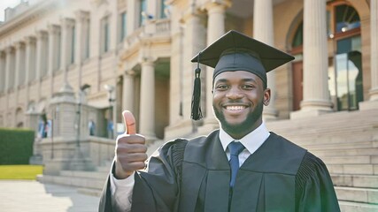 4k video of a graduation student showing thumbs up.