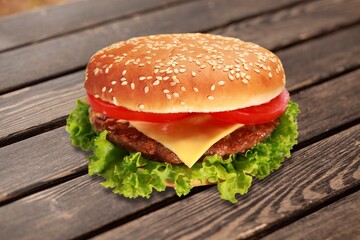 Juicy tasty fresh beef burger on the desk