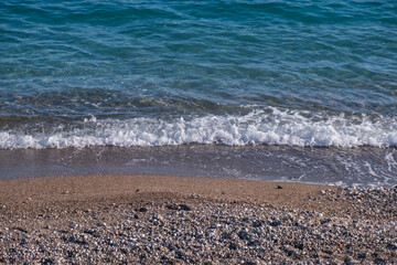 foamy waves and beach on the seashore. sandbank, plage. 