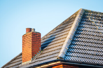 Frost snow covered british house roof in england uk