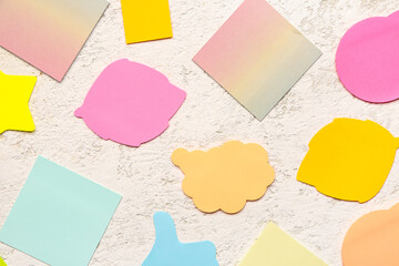 Colorful sticky notes on grunge background