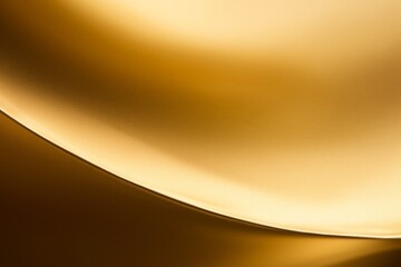 Elegant curved surface with a golden hue showcasing texture and light reflections in a soft and warm ambiance