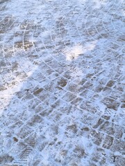 tiles on the road in the snow