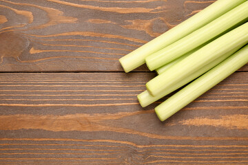 Fresh leeks on wooden background