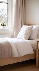 Cheerful and cozy teenager's bedroom with soft pastel colors and floral accents featuring a simple bed and charming decor filled with warmth and light