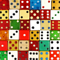 Many different colorful dice used for games of chance. Flat lay, from above.