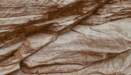 Light brown rock texture. Rough mountain surface. Close-up. Beige stone background with space for design. Web banner. Wide. Panoramic. Sandstone. Solid, rocky, slate.