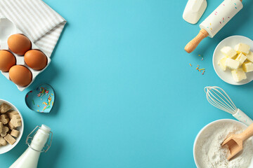 Baking ingredients and tools on a blue background. Includes eggs, butter, flour, sugar, milk, a...