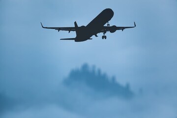 Classic airplane on beautiful sky background