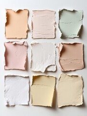 Colorful assortment of vintage grunge labels on textured paper arranged in a grid layout for creative projects in an office setting