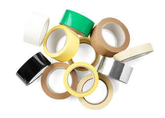 Rolls of different adhesive tapes isolated on white, top view