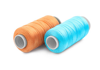Spools of bright sewing threads isolated on white