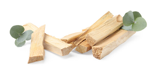 Palo santo sticks and eucalyptus leaves isolated on white