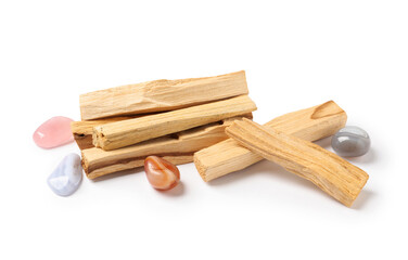Palo santo sticks and gemstones isolated on white