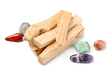 Palo santo sticks and gemstones isolated on white