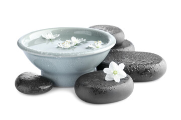 Wet spa stones and bowl of water with beautiful flowers isolated on white