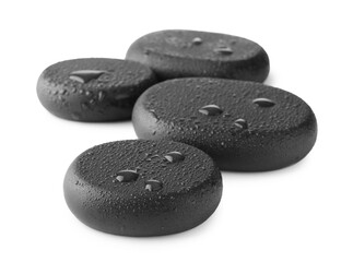 Many wet spa stones isolated on white