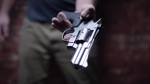 Second Amendment - Armed man holding a gun