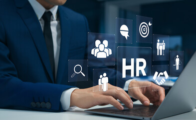 Strategic HR Management: Businessman Navigating Digital Icons of Recruitment, Employee Hierarchy, Performance Analysis, Leadership, and Team Building for       