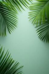 Fototapeta premium Lush green palm leaves create a tropical ambiance against a soft mint background, perfect for summer-themed designs, eco-friendly projects, or botanical illustrations