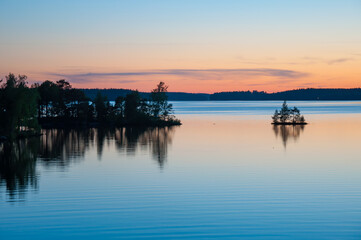 Early summer night by a calm lake in Finland