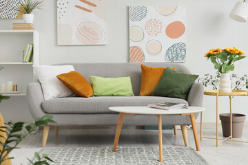 Comfortable sofa and coffee table in living room