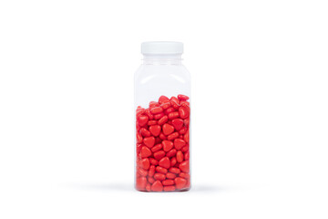 Transparent Plastic Container Filled with Red Sugar Pearls: Minimalist Still Life Photography of Decorative Sprinkles for Baking