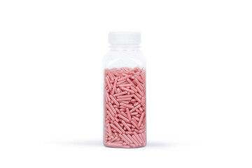 Transparent Plastic Container Filled with Pink Sugar Pearls: Minimalist Still Life Photography of Decorative Sprinkles for Baking