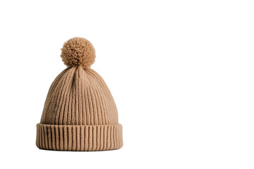 Fototapeta premium A soft, knitted wool hat, resting on a white table, with small pom-poms on top. Transparent background
