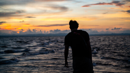 Fototapeta premium man on the beach