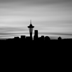 A detailed pixel art illustration showcasing a city skyline during sunset silhouetted skyline cityscape architecture illustration building city vector