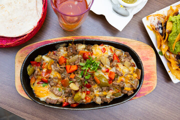 National Mexican dish alambre de ternera - veal meat roasted with vegetables and eggs