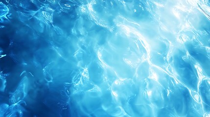 A shimmering blue water surface with light reflections.