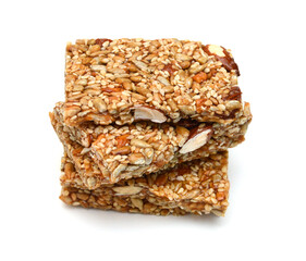 Honey bars with peanuts, sesame and sunflower seeds isolated