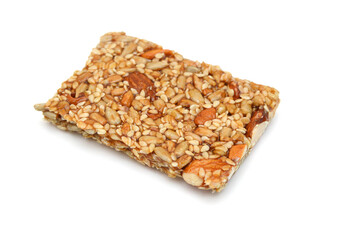 Honey bars with peanuts, sesame and sunflower seeds isolated