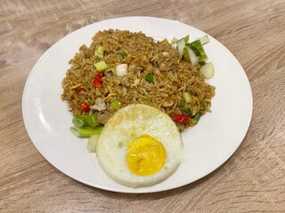 Indonesian fried rice served on white plate