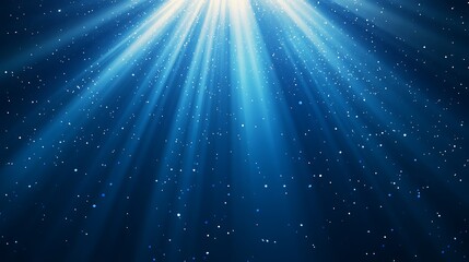 Naklejka premium A serene underwater scene with rays of light illuminating particles in the deep blue.