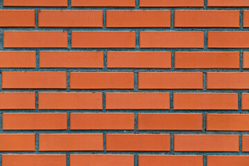 Texture of red brick wall as background, closeup