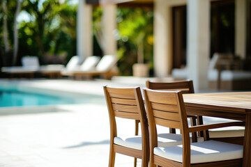 Poolside dining area with modern wooden furniture