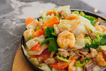 Taste and health, gourmet dish with organic ingredients of meat, seafood and vegetables