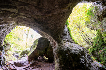 Scenic diversity of Mullerthal, Luxembourg's Little Switzerland, hiking routes, rock formations, moss-covered forests, tourist destination in Europe