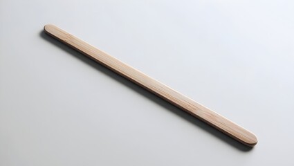 Obraz premium Simple Stir Stick on Neutral Background