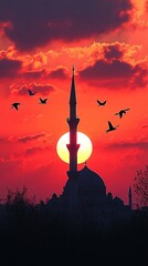 A silhouette of a mosque with a tall minaret against a vibrant sunset sky